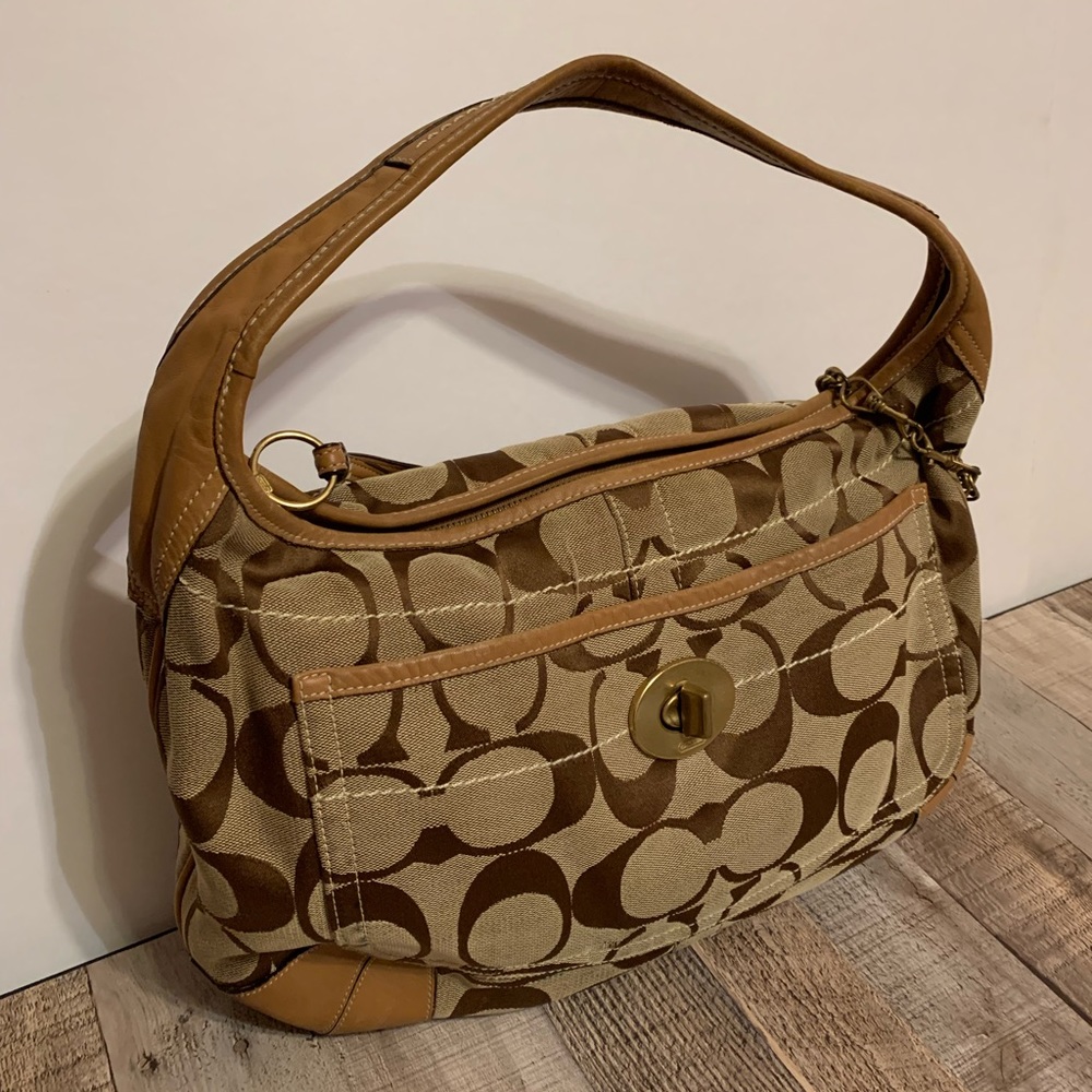 COACH signature Tote Handbag Size Medium to Large with gold accents